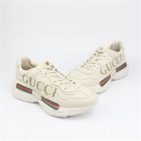 rhyton gucci logo leather sneaker pink|Gucci rhyton distressed sneakers.